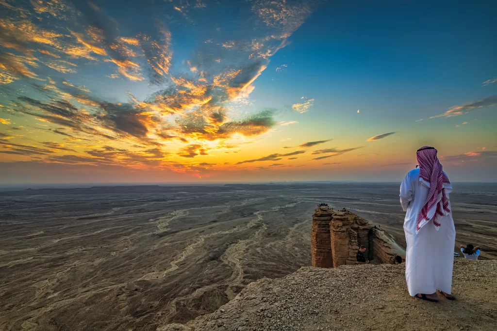 Person gazing at endless horizons, Edge Of the World, Riyadh