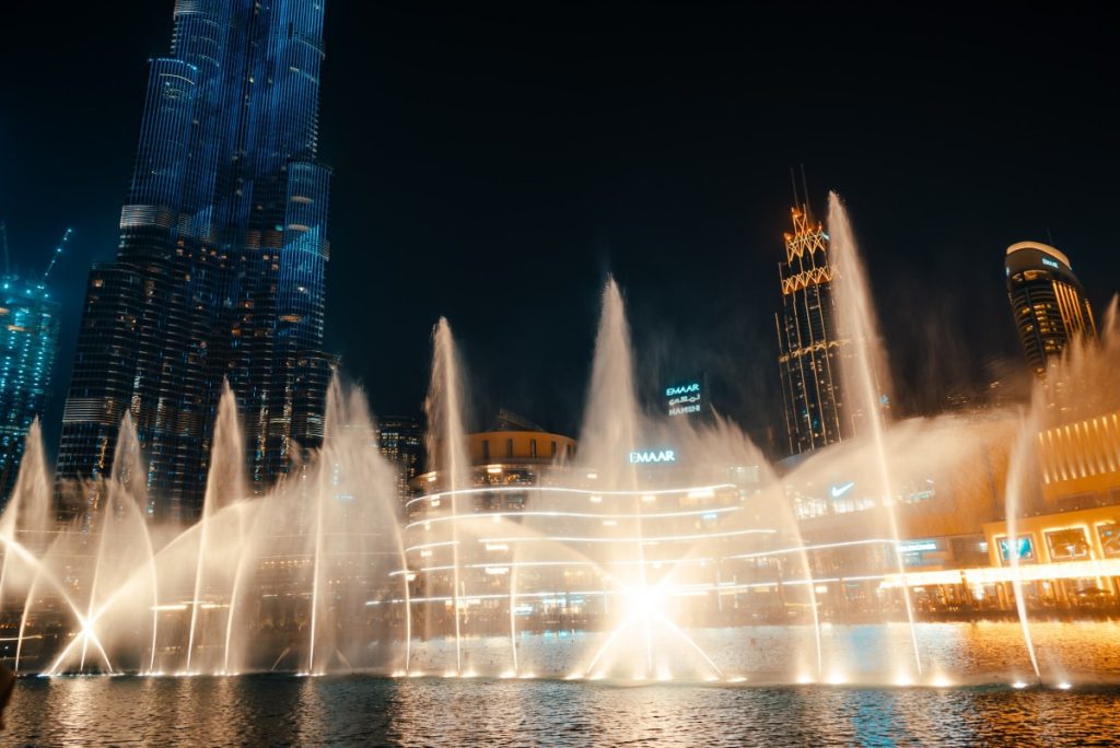 Dazzling water dance beneath the city lights. Dubai Fountain, a symphony of water, light, and music. Witness the enchantment at the heart of Dubai's iconic skyline