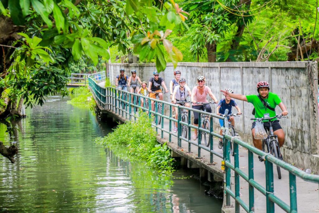 canal-side cycling tour in Thonburi